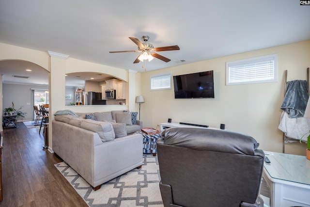 living area featuring ceiling fan, wood finished floors, visible vents, and recessed lighting