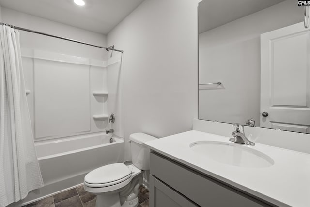 bathroom featuring shower / bath combination with curtain, vanity, and toilet