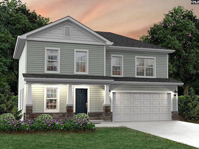 view of front of home featuring an attached garage, stone siding, and driveway