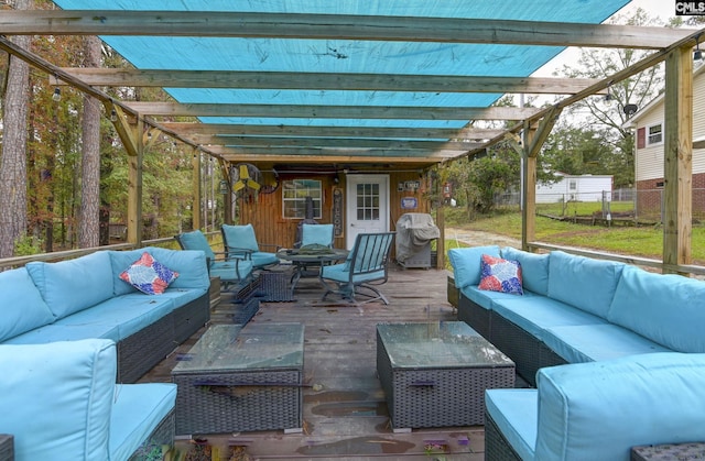 view of patio / terrace featuring a deck, an outdoor living space with a fire pit, fence, and a pergola