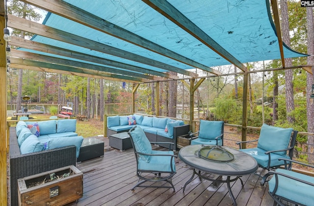 wooden deck featuring an outdoor living space and a pergola