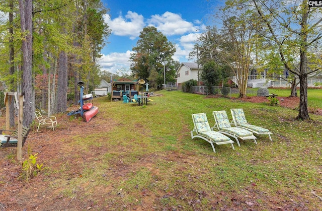 view of yard featuring fence