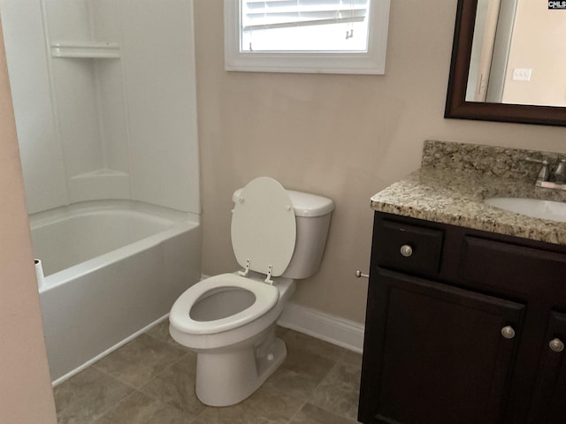 full bathroom with toilet, tile patterned floors, baseboards, and vanity