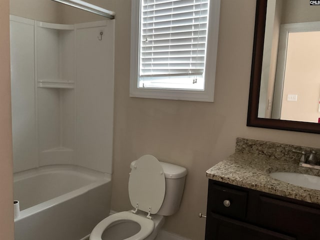 bathroom with toilet, tub / shower combination, and vanity