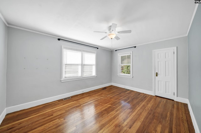 unfurnished room featuring visible vents, baseboards, ceiling fan, ornamental molding, and dark wood-style flooring