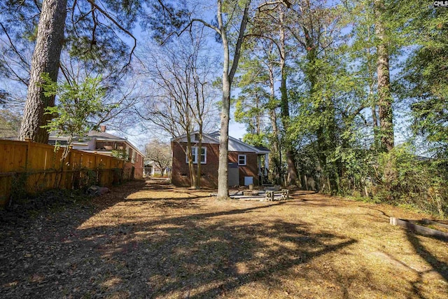 view of yard featuring fence