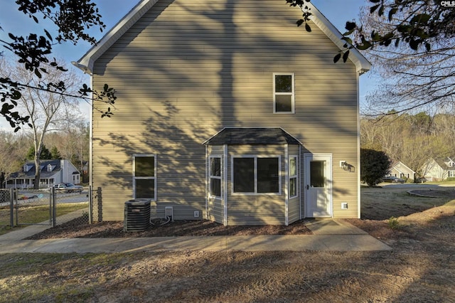 view of property exterior with cooling unit