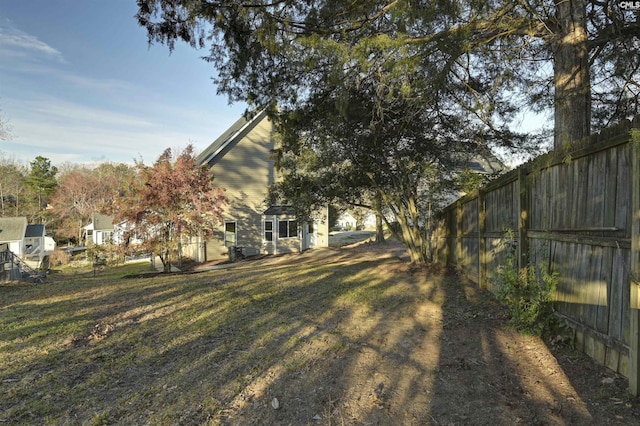 view of yard featuring fence