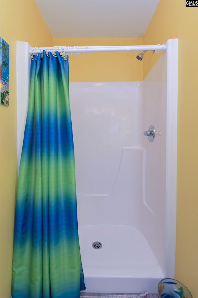 full bathroom with a shower with curtain