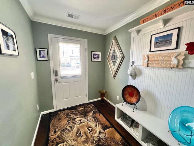 mudroom with ornamental molding, dark wood-style flooring, visible vents, and baseboards