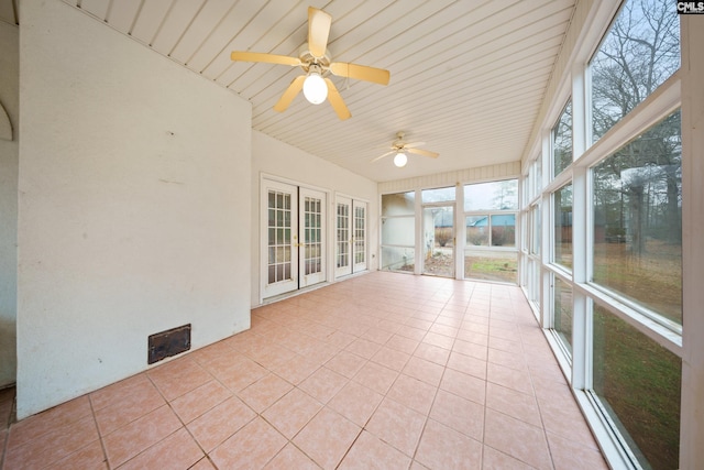 unfurnished sunroom featuring ceiling fan, wooden ceiling, and visible vents