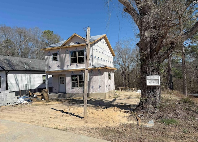 view of front of house featuring stucco siding