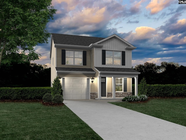 view of front of home featuring an attached garage, concrete driveway, stone siding, roof with shingles, and a front yard