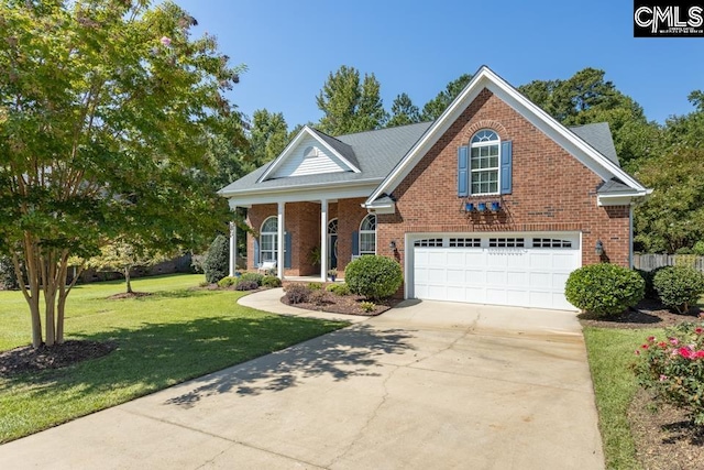 view of front of house with a garage, a front lawn, concrete driveway, and brick siding