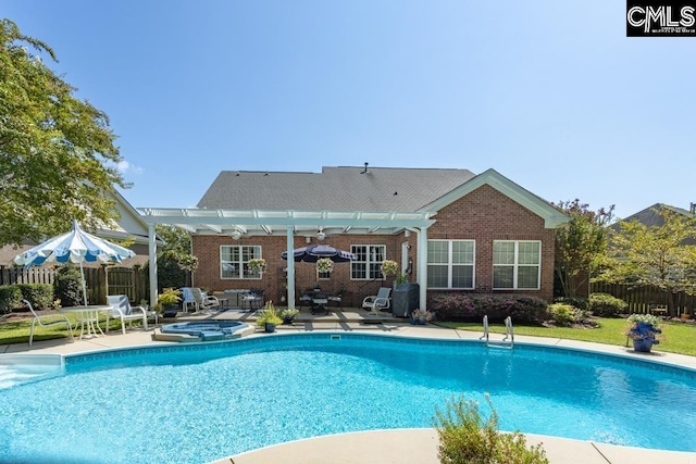 view of swimming pool with a fenced in pool, a patio area, fence, and a pergola