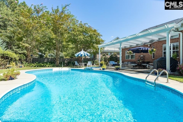 view of pool with a fenced in pool, a patio area, fence, and a pergola