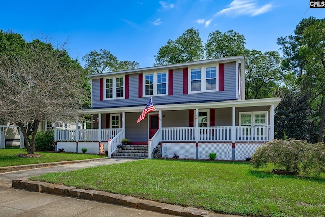 view of front facade featuring a porch and a front lawn