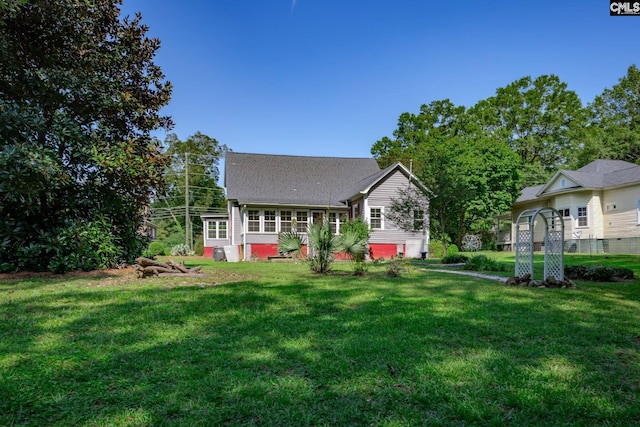 exterior space featuring a front lawn