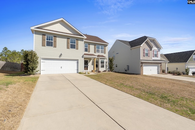 traditional-style home with a garage, driveway, a front lawn, and board and batten siding