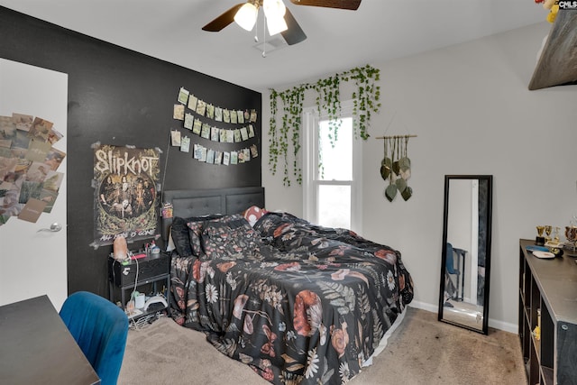 bedroom featuring ceiling fan, carpet flooring, and baseboards