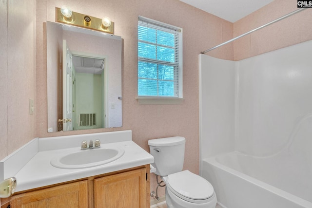 bathroom featuring toilet, shower / bathtub combination, visible vents, and vanity