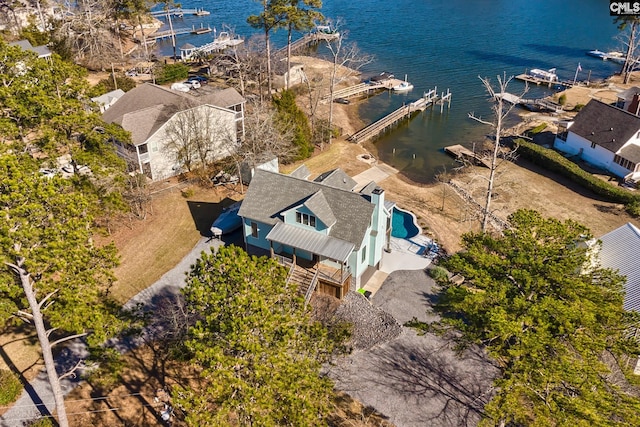 bird's eye view with a water view