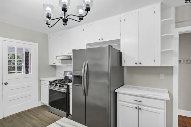 kitchen featuring dark wood-style flooring, open shelves, appliances with stainless steel finishes, white cabinets, and under cabinet range hood