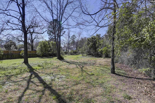 view of yard with fence