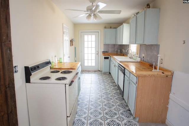 kitchen with tasteful backsplash, white range with electric stovetop, dishwasher, ceiling fan, and a sink