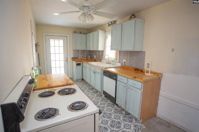 kitchen with ceiling fan, white appliances, butcher block countertops, a sink, and backsplash