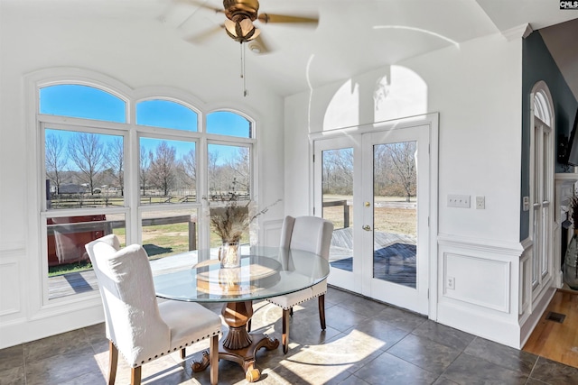 sunroom / solarium featuring a wealth of natural light and french doors