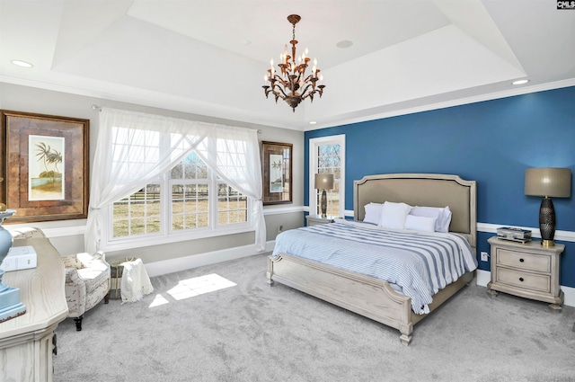 bedroom with carpet, a raised ceiling, crown molding, and baseboards