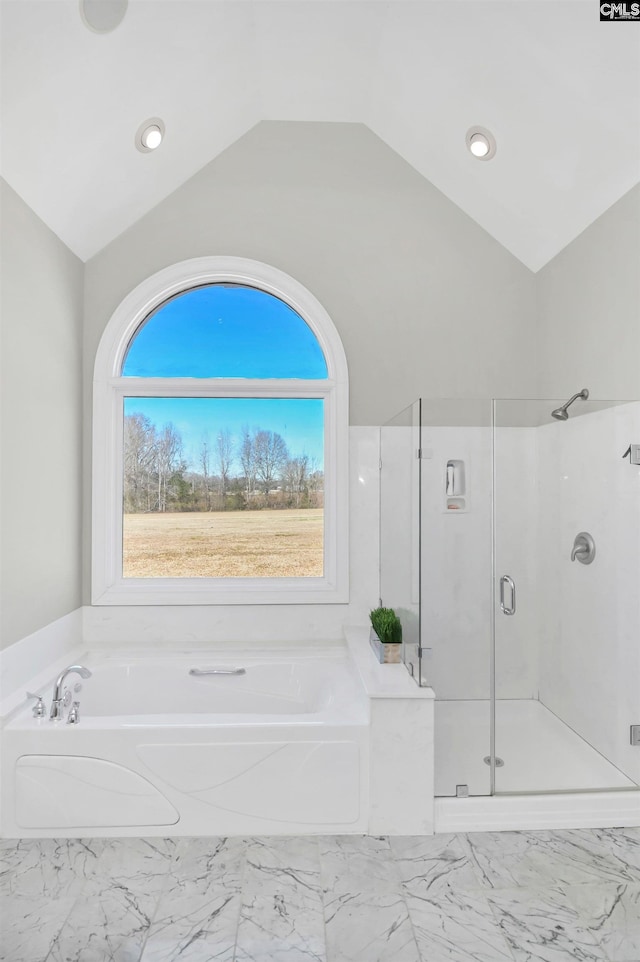 full bathroom with marble finish floor, a garden tub, recessed lighting, vaulted ceiling, and a shower stall