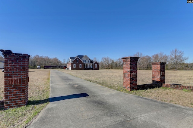 view of road featuring driveway