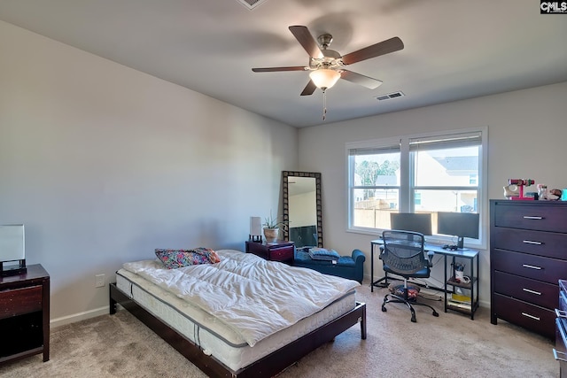 bedroom featuring a ceiling fan, baseboards, visible vents, and carpet flooring