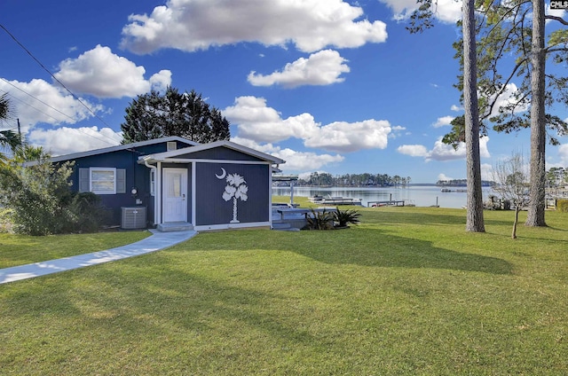 exterior space featuring a water view and central AC