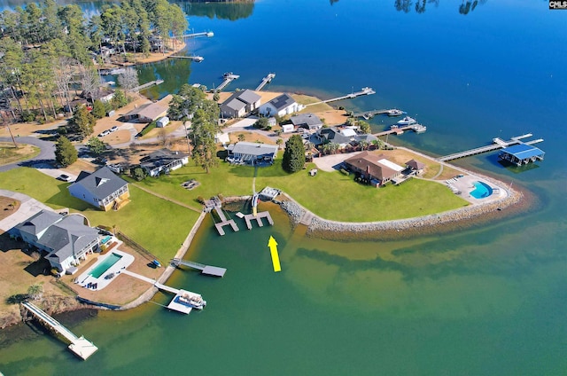 birds eye view of property featuring a water view and a residential view