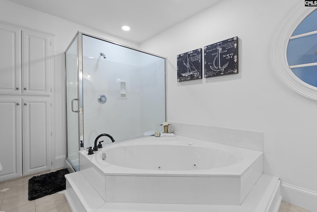 full bath featuring tile patterned floors, recessed lighting, a stall shower, and a whirlpool tub