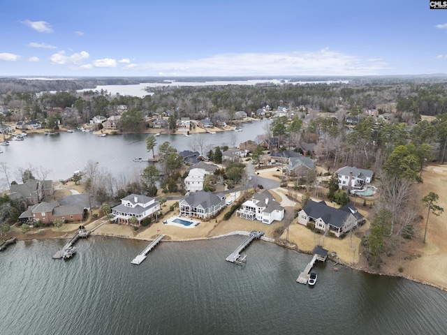 aerial view with a residential view and a water view