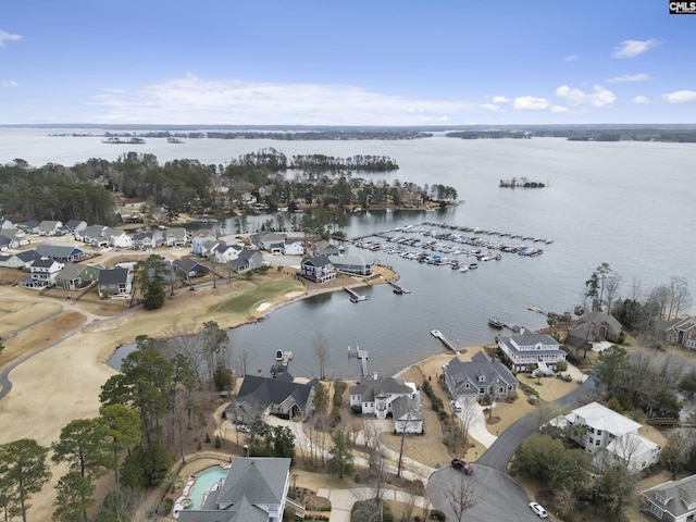 bird's eye view with a water view and a residential view