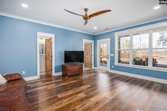 living room with baseboards, dark wood-style flooring, crown molding, and recessed lighting