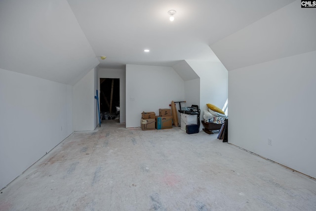 additional living space with vaulted ceiling