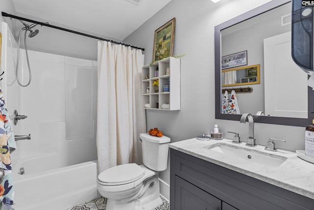 full bathroom with vanity, shower / bath combo with shower curtain, and toilet