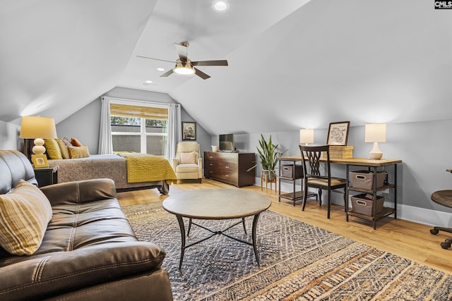 bedroom featuring lofted ceiling, recessed lighting, wood finished floors, and baseboards