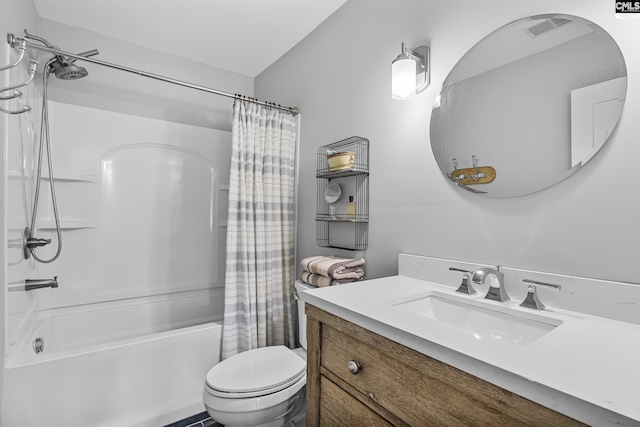 bathroom featuring shower / tub combo, vanity, and toilet