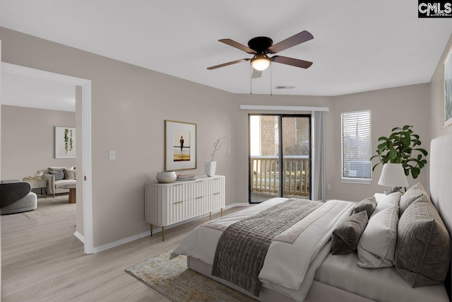 bedroom featuring access to outside, a ceiling fan, light wood-style flooring, and baseboards