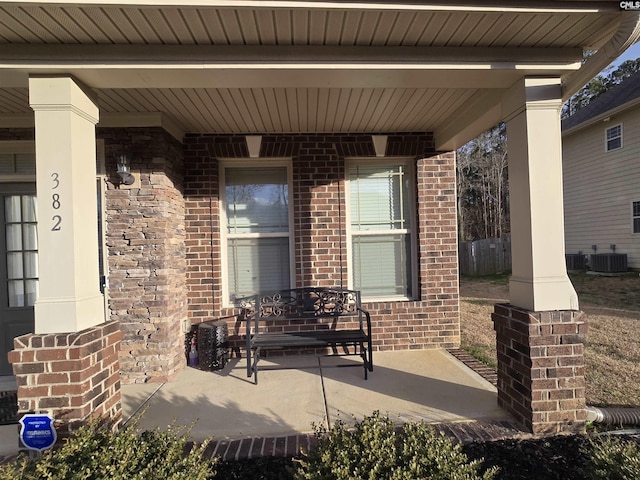 view of patio / terrace with covered porch and central air condition unit