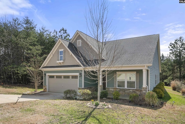 craftsman-style house with stone siding, roof with shingles, an attached garage, and concrete driveway