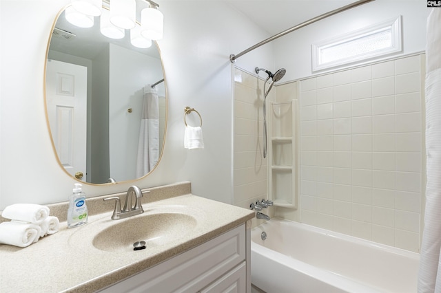 bathroom featuring shower / bath combination with curtain, vanity, and visible vents