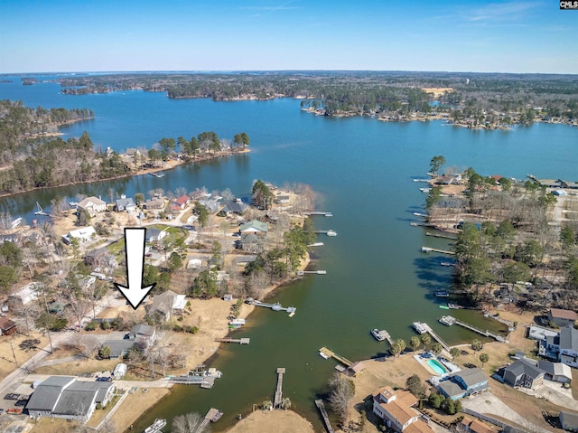 birds eye view of property featuring a water view